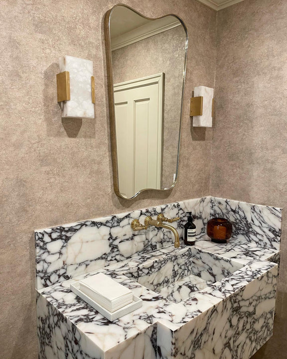 Covet Wide Clip Bath Sconce, a premium Bath light by Visual Comfort & Co. Close - up image of its design.