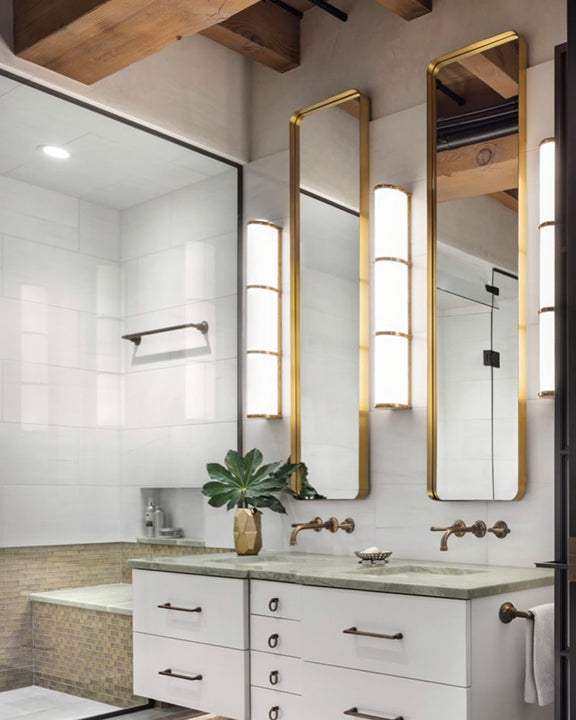 Bleeker Triple Bath Sconce, a premium Bath light by Visual Comfort & Co. Close - up image of its design.