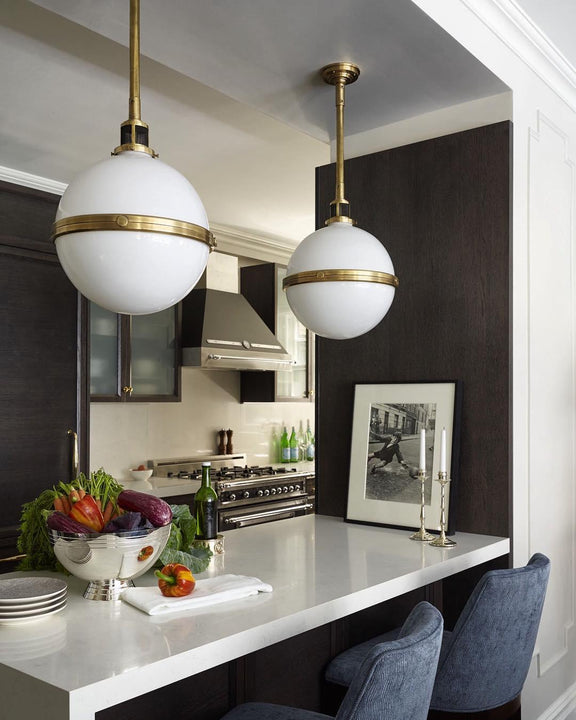 McCarren Large Globe Pendant, a premium Pendant light by Visual Comfort & Co. Close - up image of its design.