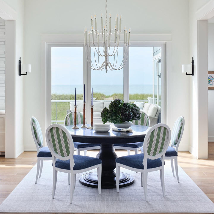 Aspen Iron Wall Lamp, a premium Decorative light by Visual Comfort & Co. Close - up image of its design.