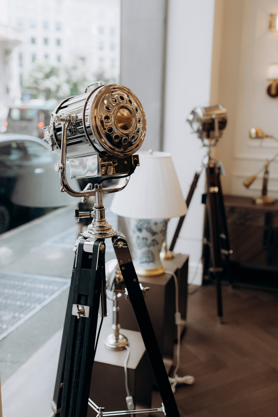 Montauk Search Light Floor Lamp, a premium Functional light by Visual Comfort & Co. Close - up image of its design.