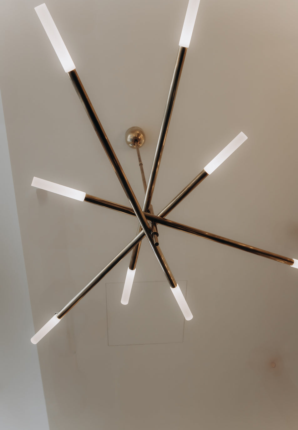 Rousseau Large Articulating Chandelier, a premium Chandelier light by Visual Comfort & Co. Close - up image of its design.