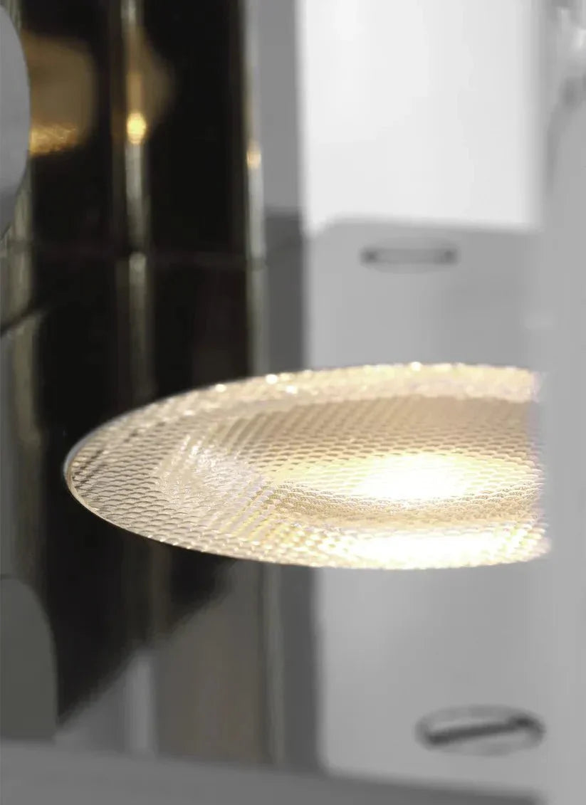 Duelle Medium Wall Sconce, a premium Wall light by Visual Comfort & Co. Close - up image of its design.