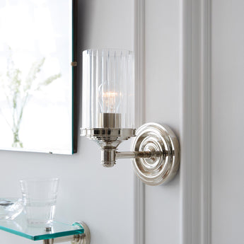 Ava Single Sconce, a premium Bath light by Visual Comfort. Close - up image of its design.