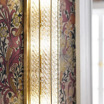 Eaton Linear Sconce, a premium Decorative light by Visual Comfort & Co. Close - up image of its design.