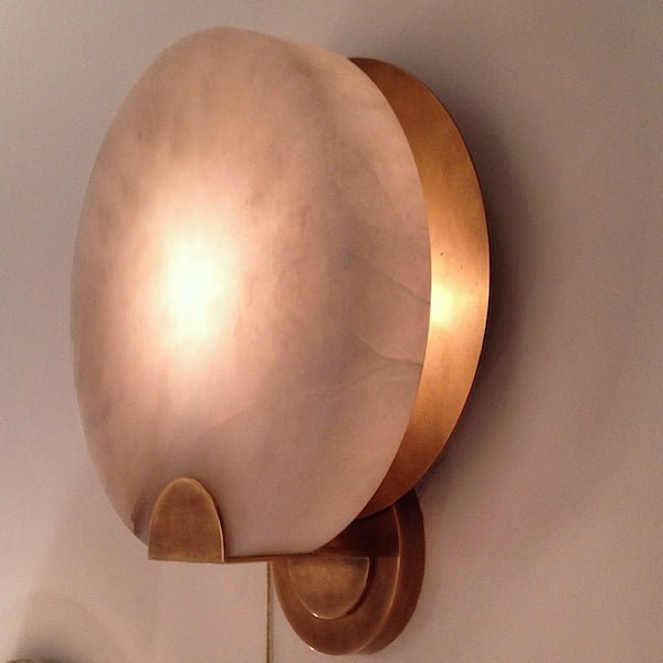 Iveala Single Sconce, a premium Decorative light by Visual Comfort & Co. Close - up image of its design.