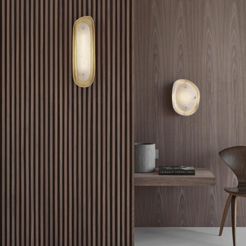 Samos Small Sculpted Sconce, a premium Decorative light by Visual Comfort. Close - up image of its design.