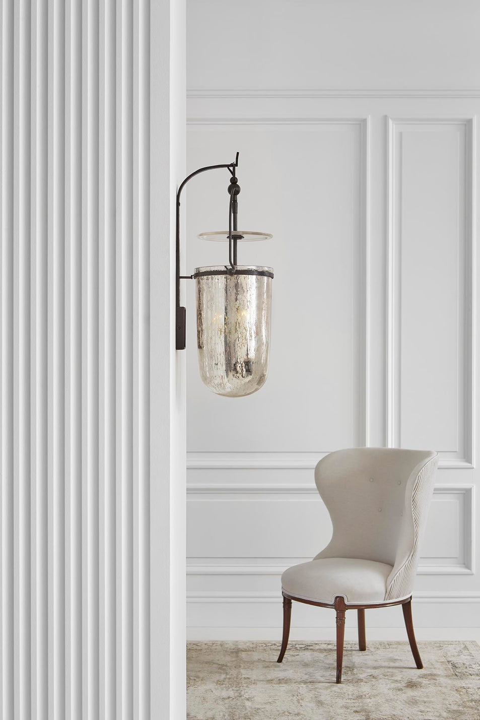 Lorford Medium Sconce, a premium Decorative light by Visual Comfort. Close - up image of its design.