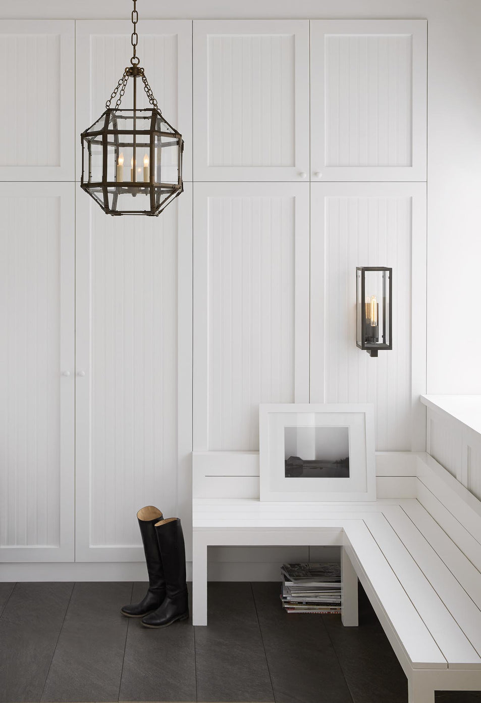 Fresno Framed Medium Sconce, a premium Wall light by Visual Comfort. Close - up image of its design.