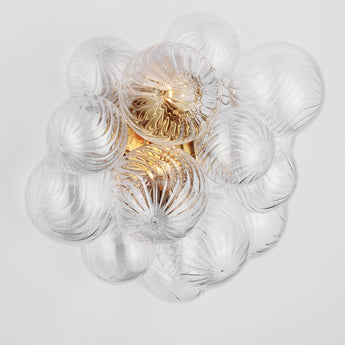 Talia Medium Sconce in Gild with Clear Swirled Glass