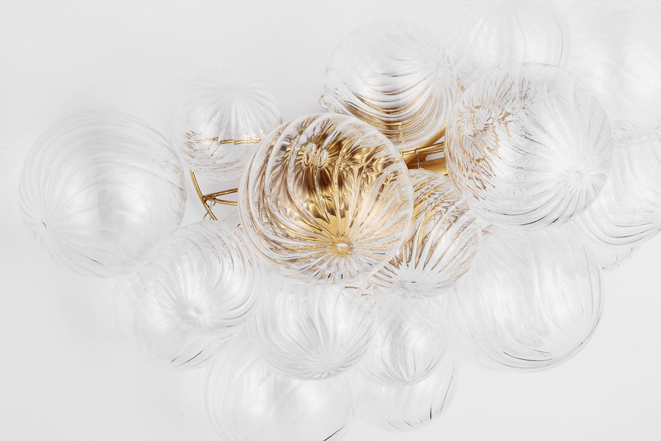 Talia Large Sconce in Gild with Clear Swirled Glass