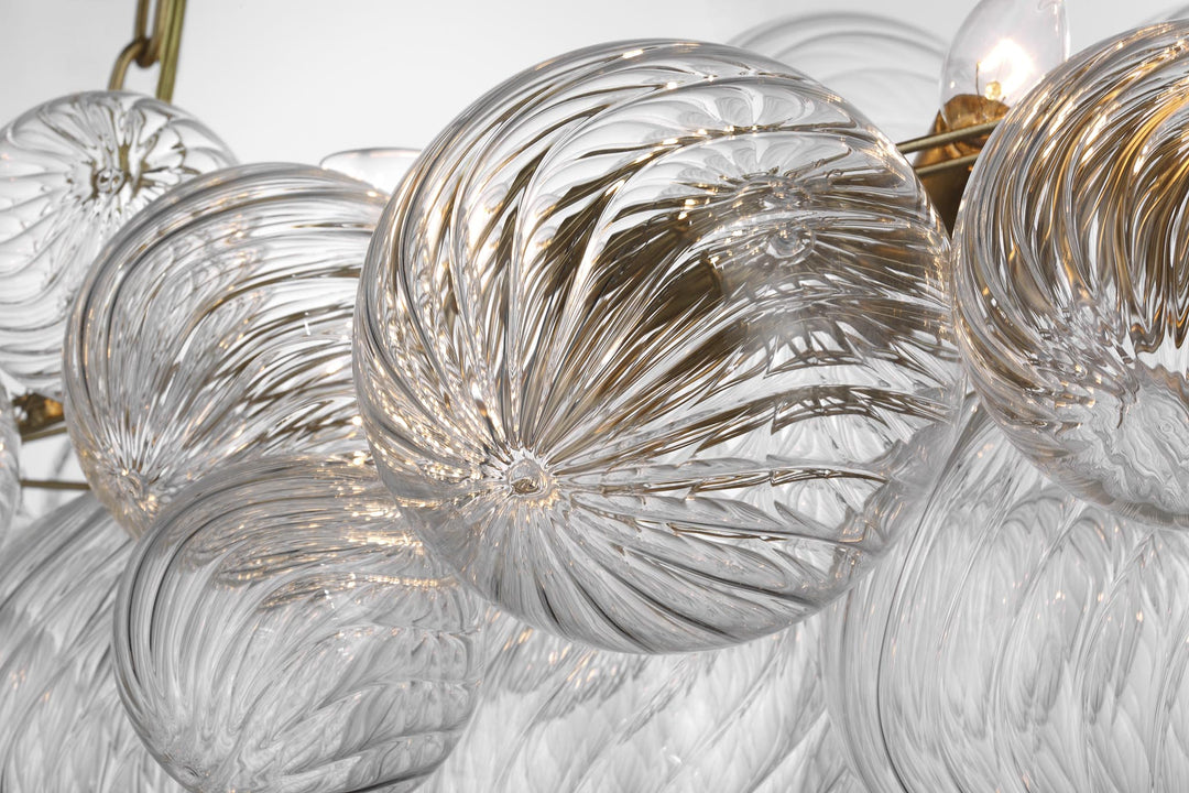 Talia Medium Linear Chandelier in Gild with Clear Swirled Glass
