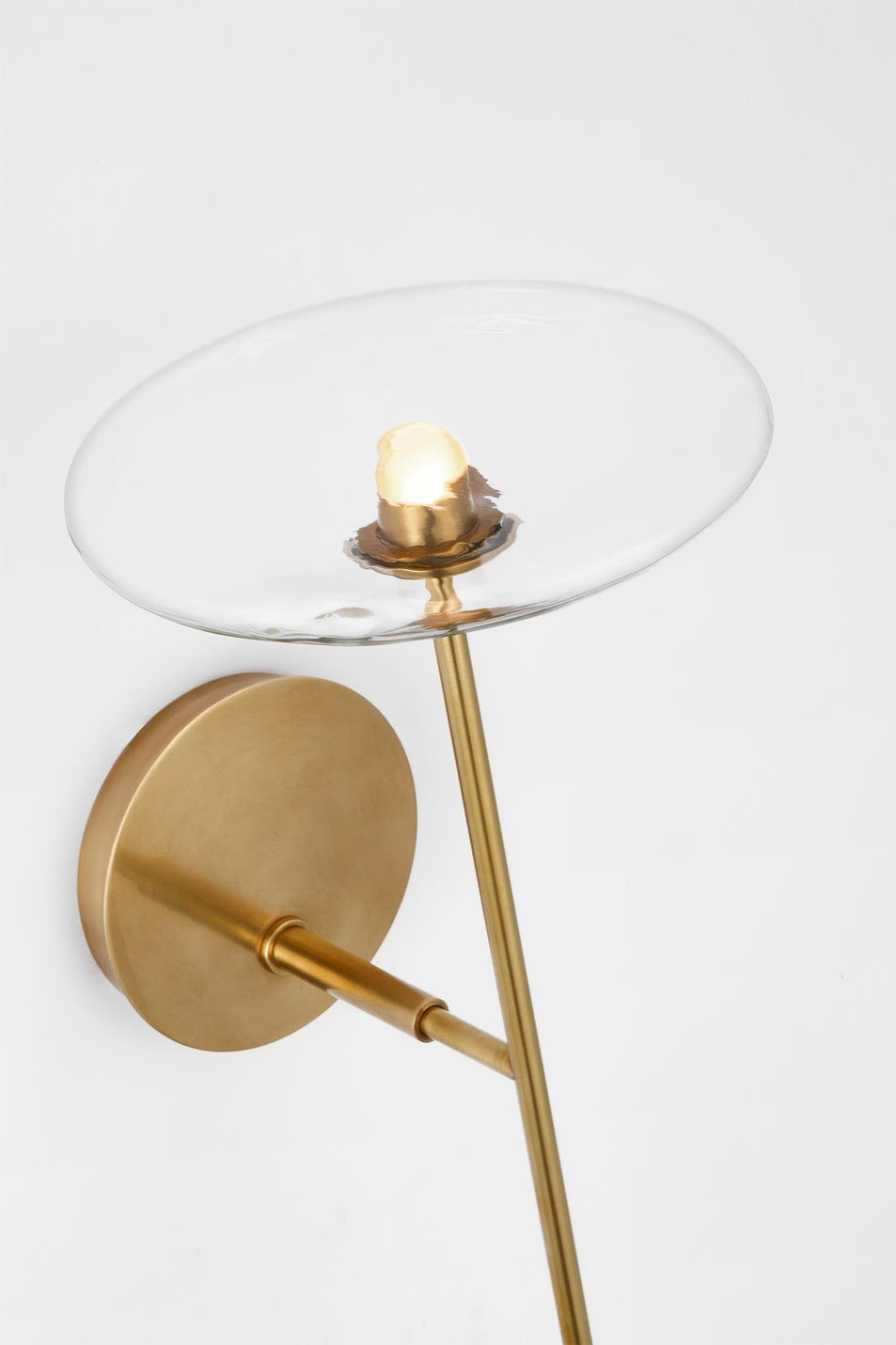 Calvino Large Tail Sconce in Hand-Rubbed Antique Brass with Clear Glass