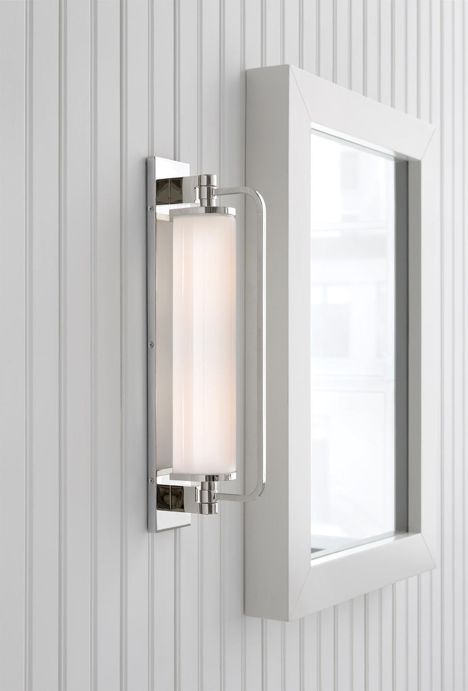 Keeley Tall Pivoting Sconce, a premium Bath light by Visual Comfort. Close - up image of its design.