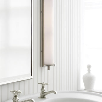 Calliope Tall Bath Light, a premium Bath light by Visual Comfort. Close - up image of its design.