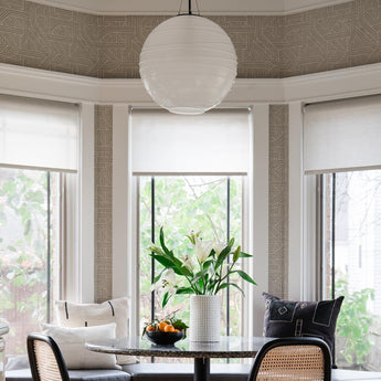 Hailey Medium Round Pendant, a premium Pendant light by Visual Comfort & Co. Close - up image of its design.