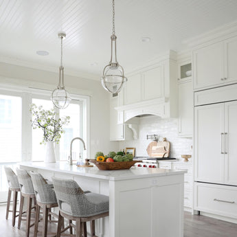 Gracie Medium Captured Globe Pendant, a premium Pendant light by Visual Comfort & Co. Close - up image of its design.