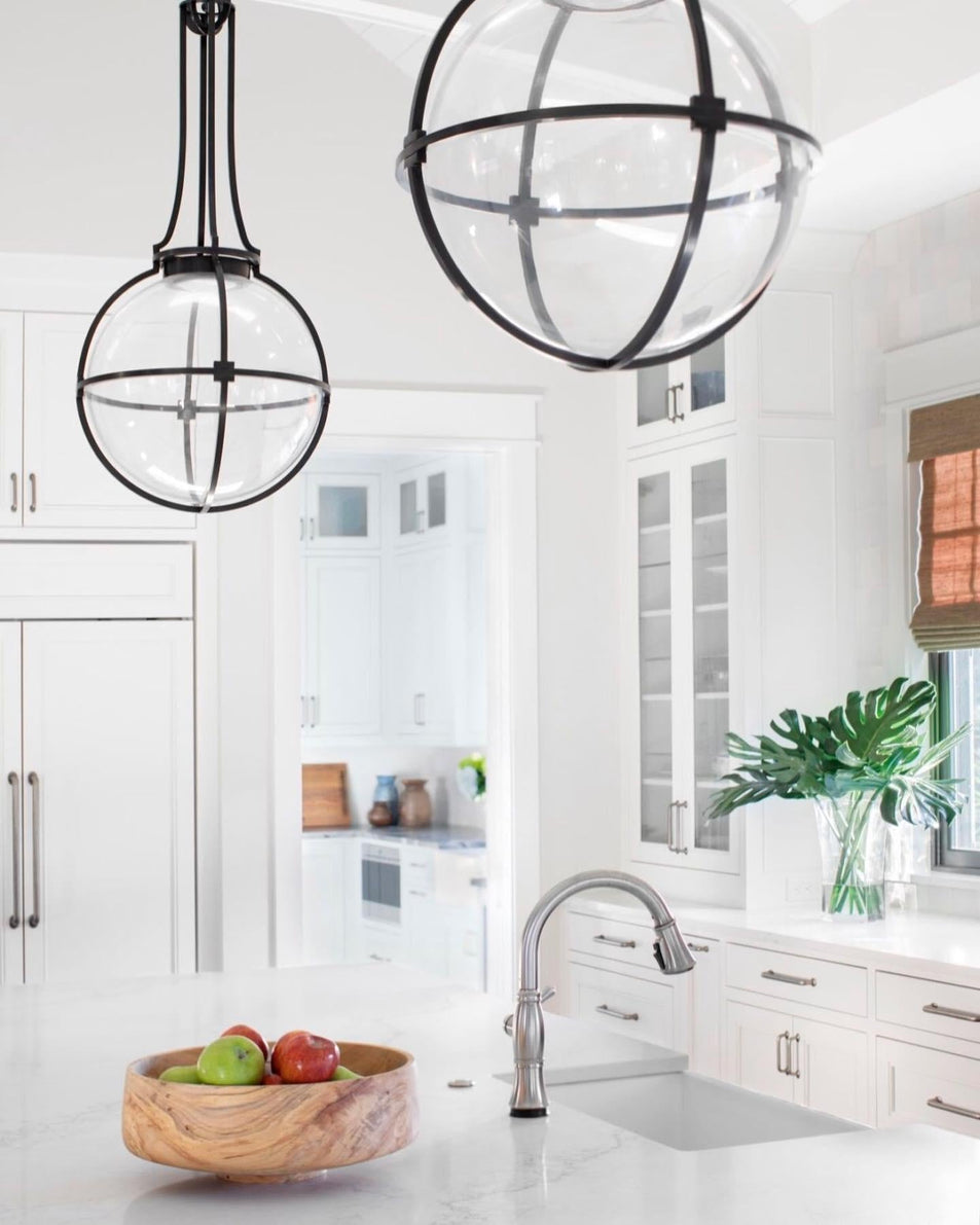 Gracie Medium Captured Globe Pendant, a premium Pendant light by Visual Comfort & Co. Close - up image of its design.