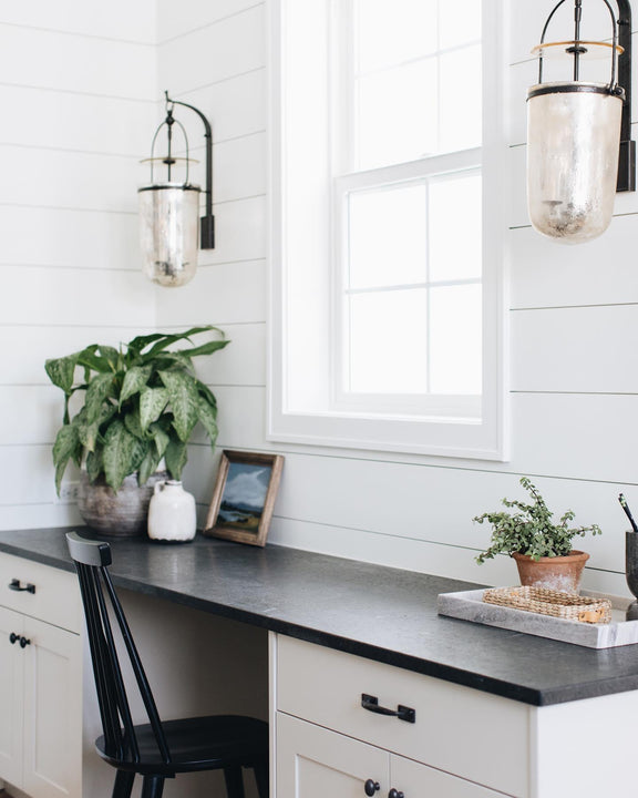 Lorford Medium Sconce, a premium Decorative light by Visual Comfort & Co. Close - up image of its design.