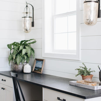 Lorford Medium Sconce, a premium Decorative light by Visual Comfort & Co. Close - up image of its design.