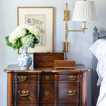 Dorchester Double Backplate Swing Arm, a premium Functional light by Visual Comfort & Co. Close - up image of its design.