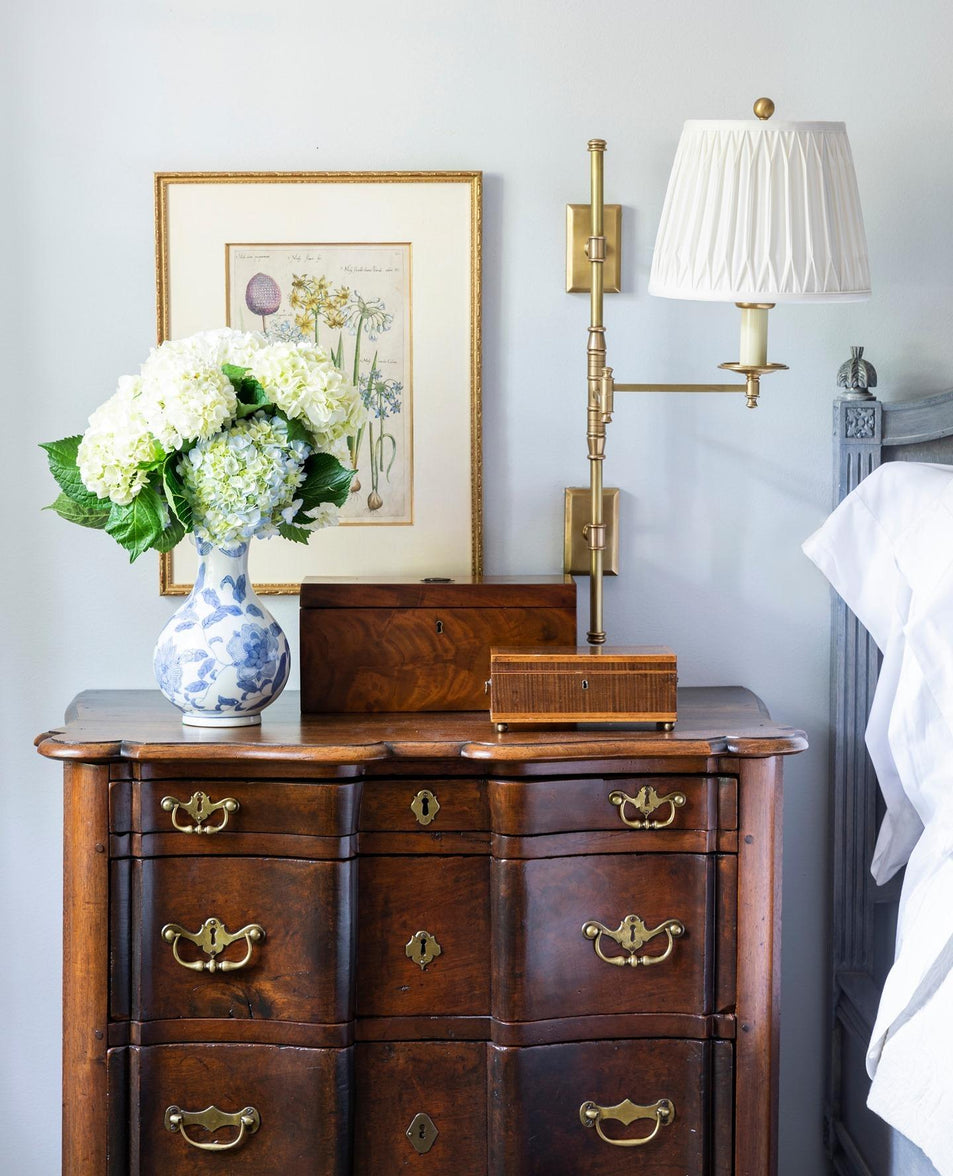 Dorchester Double Backplate Swing Arm, a premium Functional light by Visual Comfort & Co. Close - up image of its design.