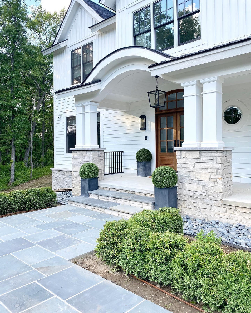 Darlana Medium Hanging Lantern, a premium Ceiling light by Visual Comfort & Co. Close - up image of its design.