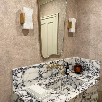 Covet Wide Clip Bath Sconce, a premium Bath light by Visual Comfort & Co. Close - up image of its design.