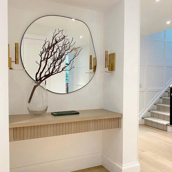 Melange Floating Disc Sconce, a premium Decorative light by Visual Comfort & Co. Close - up image of its design.