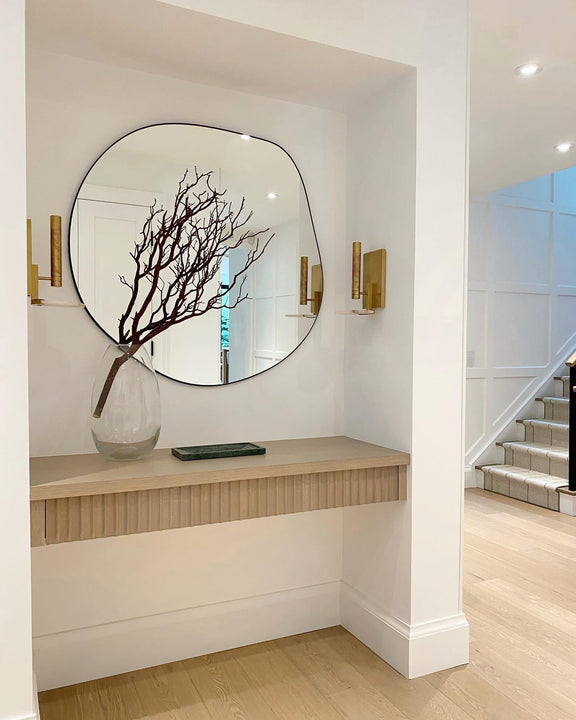 Melange Floating Disc Sconce, a premium Decorative light by Visual Comfort & Co. Close - up image of its design.