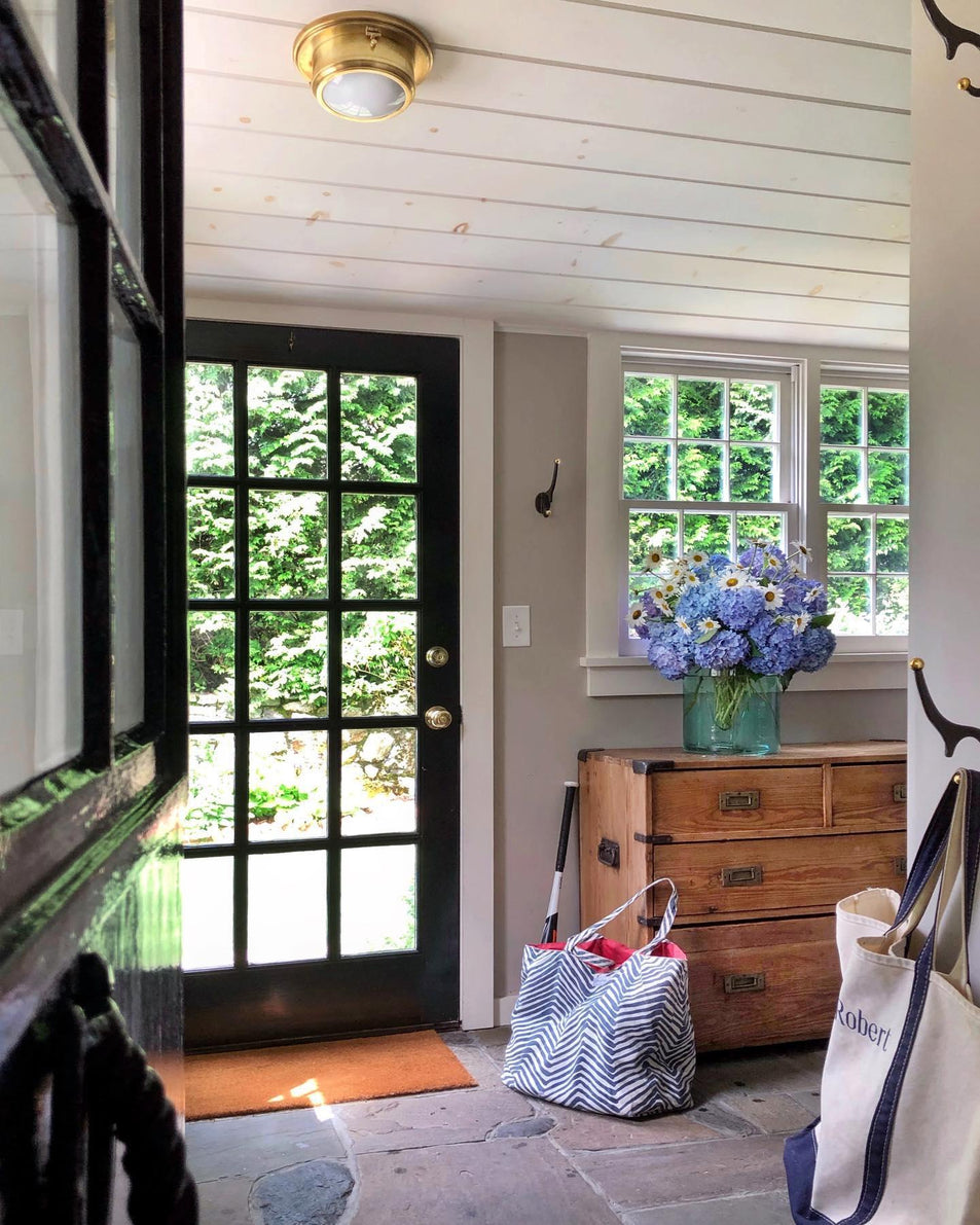 Marine Porthole Small Flush Mount, a premium Flush Mount light by Visual Comfort & Co. Close - up image of its design.