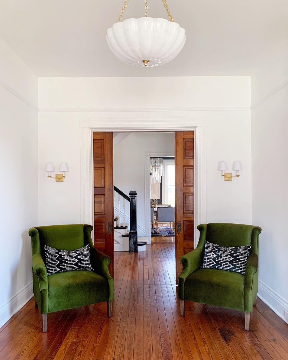 Evans Double Arm Sconce, a premium Decorative light by Visual Comfort & Co. Close - up image of its design.