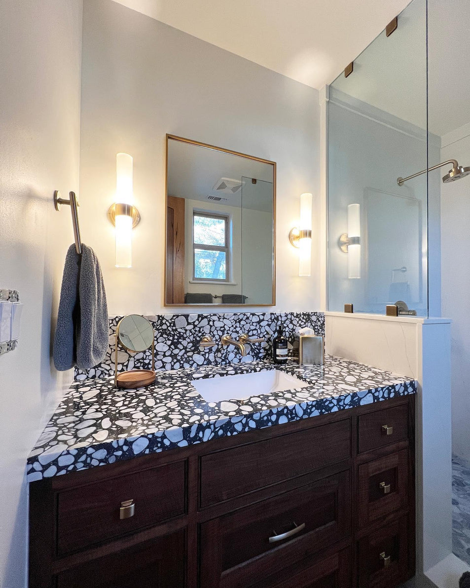 Jones Medium Double Sconce, a premium Bath light by Visual Comfort & Co. Close - up image of its design.