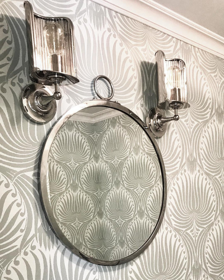 Rivington Shield Sconce, a premium Decorative light by Visual Comfort & Co. Close - up image of its design.