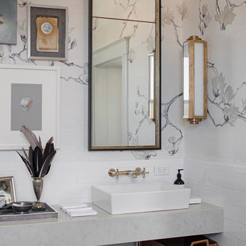 Keating Medium Sconce, a premium Bath light by Visual Comfort & Co. Close - up image of its design.