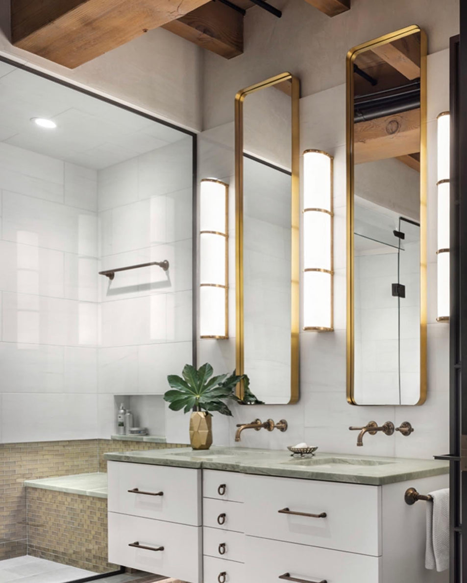 Bleeker Triple Bath Sconce, a premium Bath light by Visual Comfort & Co. Close - up image of its design.