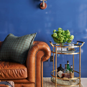 Riley Single Sconce, a premium Decorative light by Visual Comfort & Co. Close - up image of its design.