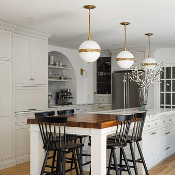 Hendricks Small Globe Pendant, a premium Pendant light by Visual Comfort & Co. Close - up image of its design.