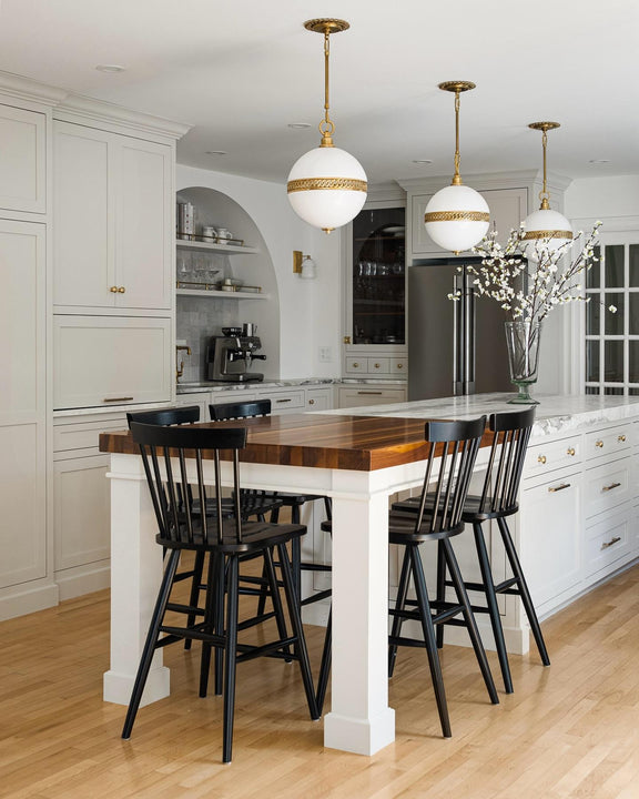 Hendricks Small Globe Pendant, a premium Pendant light by Visual Comfort & Co. Close - up image of its design.