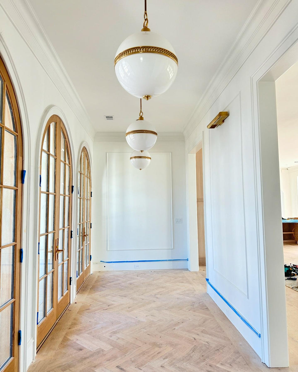 Hendricks Large Globe Pendant, a premium Pendant light by Visual Comfort & Co. Close - up image of its design.