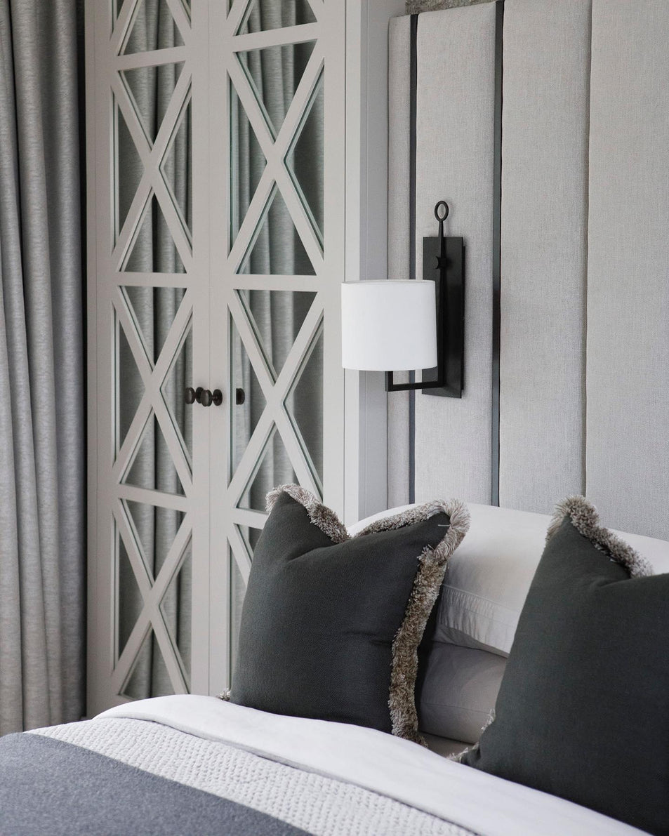 Aspen Iron Wall Lamp, a premium Decorative light by Visual Comfort & Co. Close - up image of its design.