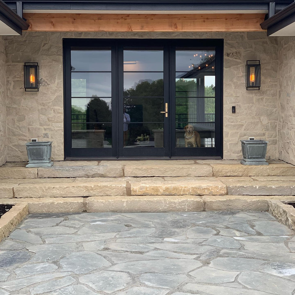 Halle Large Wall Lantern, a premium Wall light by Visual Comfort & Co. Close - up image of its design.