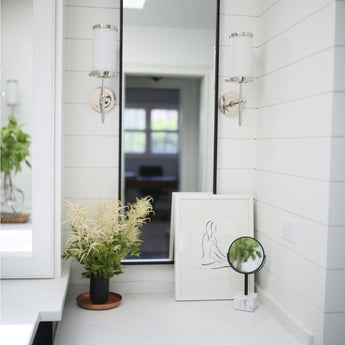 Bryant Bath Sconce, a premium Bath light by Visual Comfort & Co. Close - up image of its design.