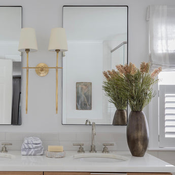 Bryant Large Double Tail Sconce, a premium Decorative light by Visual Comfort & Co. Close - up image of its design.