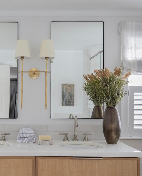 Bryant Large Double Tail Sconce, a premium Decorative light by Visual Comfort & Co. Close - up image of its design.