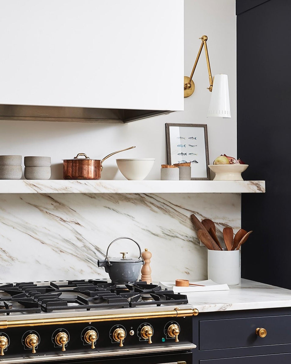 Antonio Adjustable Two Arm Wall Lamp, a premium Functional light by Visual Comfort & Co. Close - up image of its design.