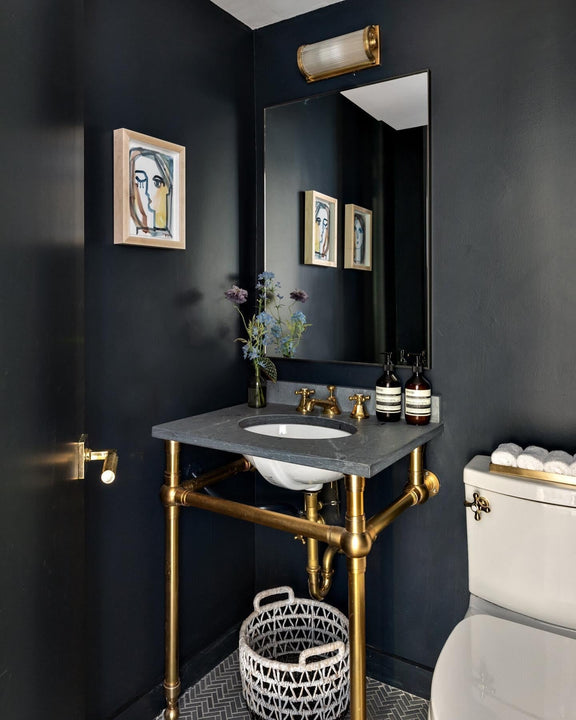 Dresser Short Glass Rod Light, a premium Bath light by Visual Comfort & Co. Close - up image of its design.