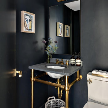 Dresser Short Glass Rod Light, a premium Bath light by Visual Comfort & Co. Close - up image of its design.