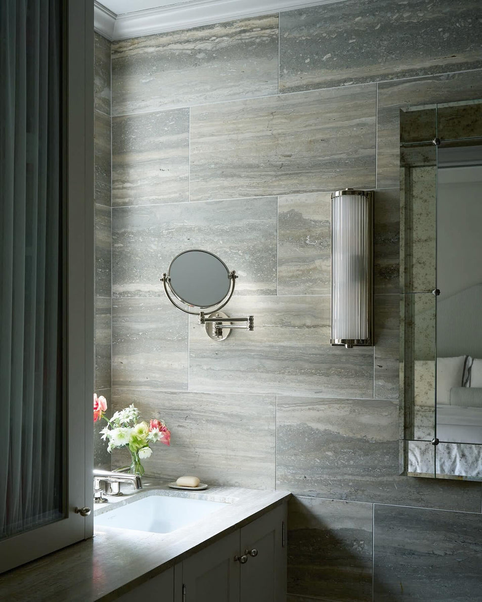 Dresser Long Glass Rod Light, a premium Bath light by Visual Comfort & Co. Close - up image of its design.