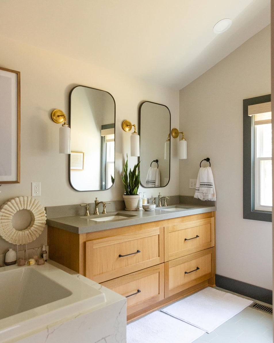 Katie Small Cylinder Sconce, a premium Bath light by Visual Comfort & Co. Close - up image of its design.